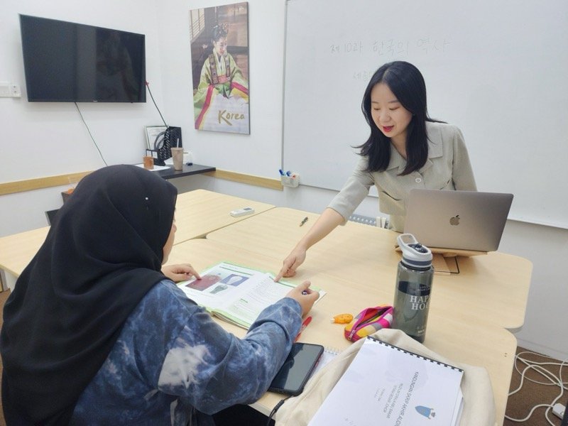 Teacher providing consistent instruction