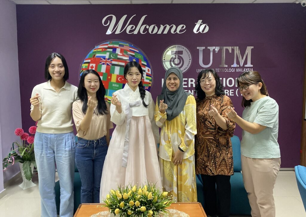Group photo during a university partnership visit at UTM